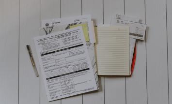 Stack of papers flat on table