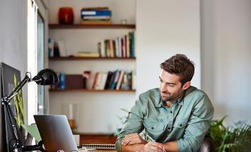 young man laptop