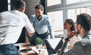 shaking hands during meeting